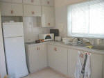 The kitchen is fully equipped including a washing machine. A microwave oven can be supplied on request.