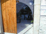 Peek in the enterance gate at Kontoyiannis house